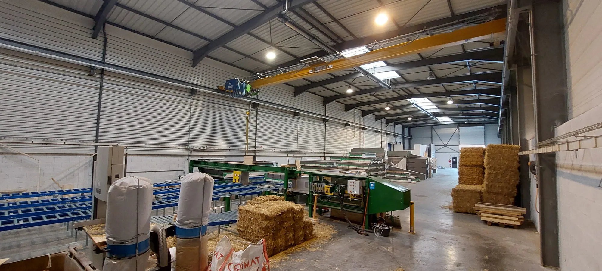 Precast Building Elements from Local and Bio Based Straw and Wood